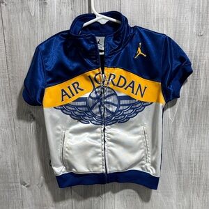 Air Jordan Blue and Yellow Jacket. D1